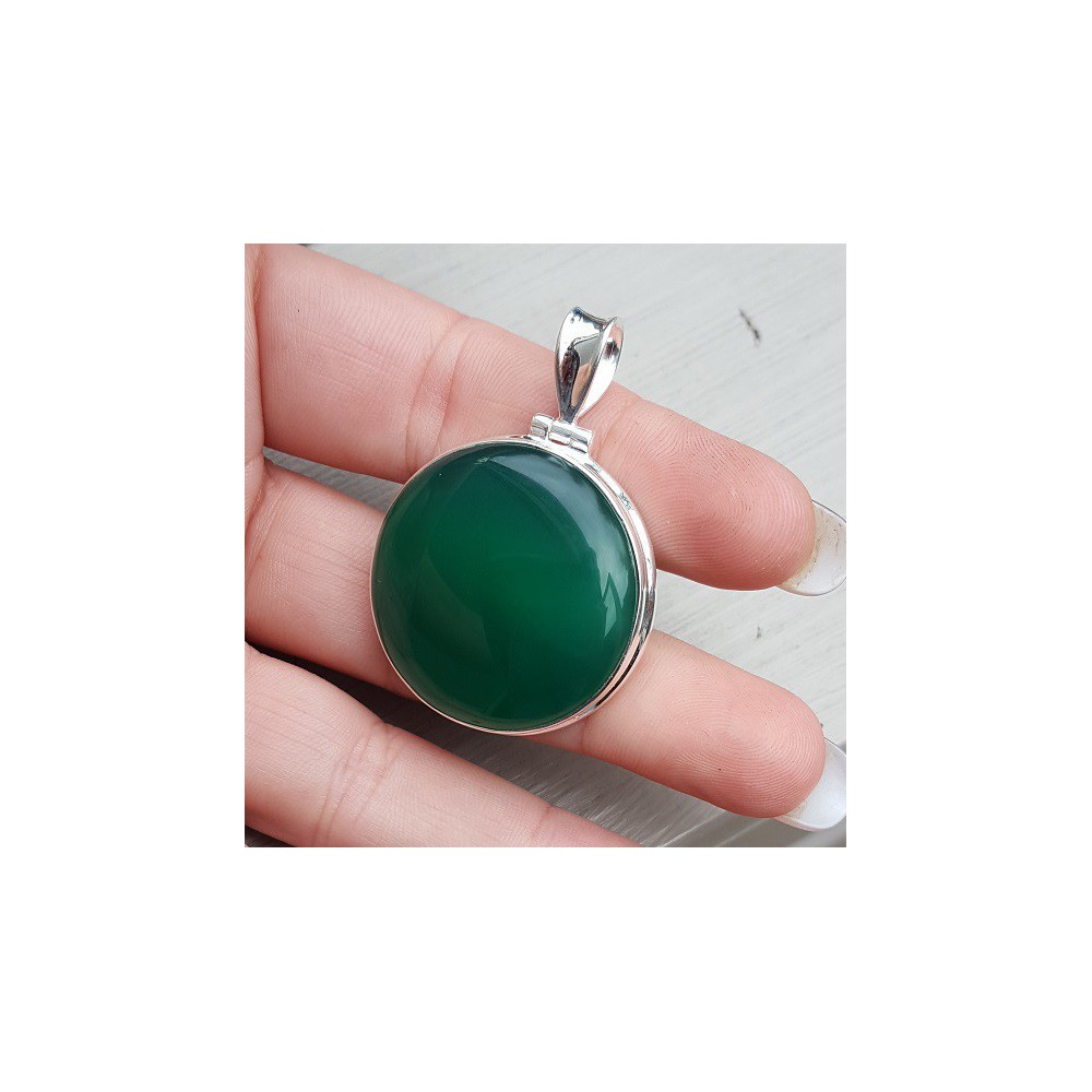 Silver pendant set with round cabochon green Onyx