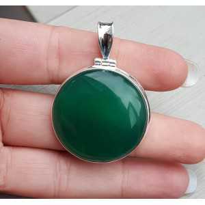 Silver pendant set with round cabochon green Onyx