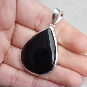 Silver pendant with drop-shaped cabochon black Onyx