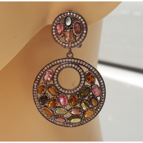 Zilveren oorbellen gezet met facet Toermalijn en Zirkonia