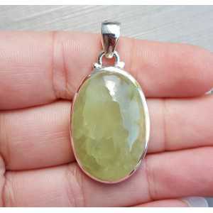 Silver pendant with oval cabochon its color