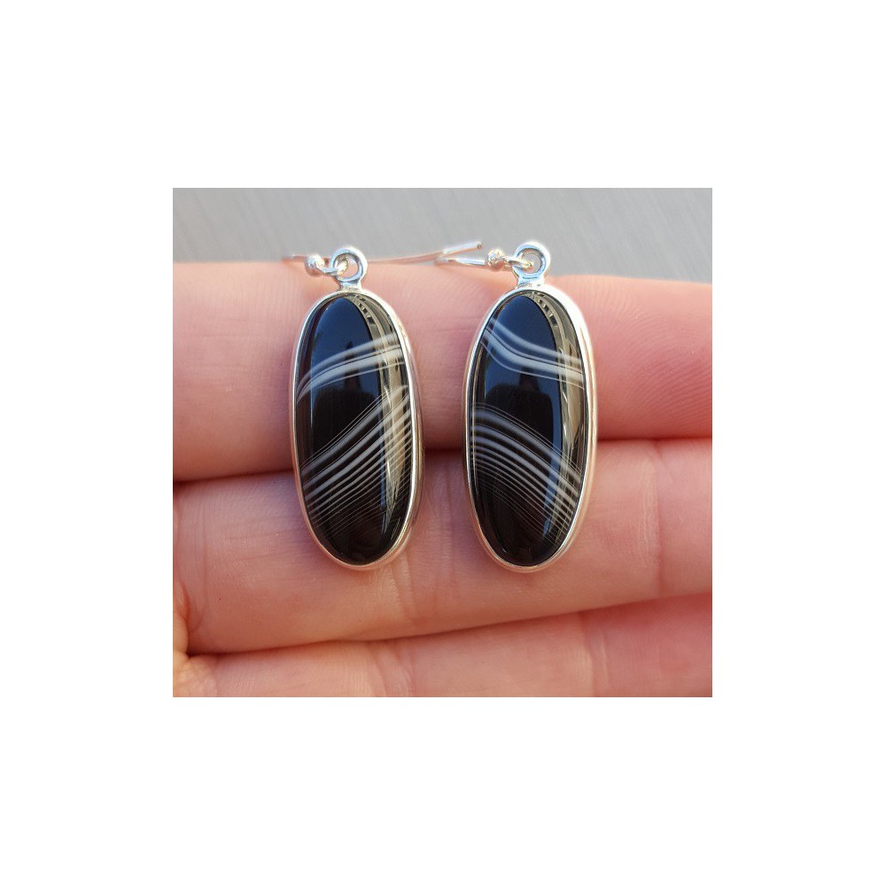 Silver earrings with small oval black Botswana Agate