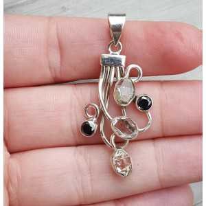 Silver pendant set with Herkimer Diamond and Onyx