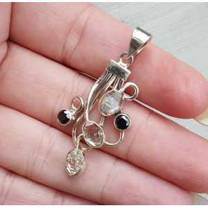 Silver pendant set with Herkimer Diamond and Onyx