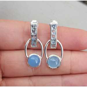 Silver earrings set with blue Topazes and Chalcedony