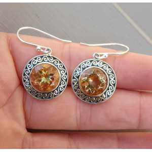 Silver earrings set with round Citrine