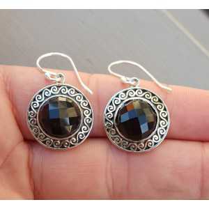Silver earrings with round facet Onyx