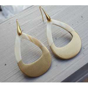 Earrings with open drop of buffalo horn half gold half white