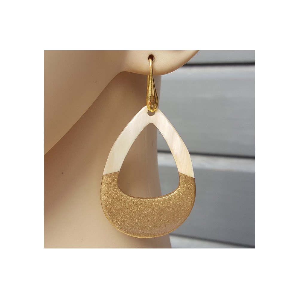 Earrings with open drop of buffalo horn half gold half white