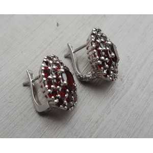 Silver earrings with oval and round faceted Garnets