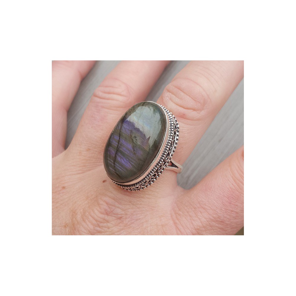 Silver ring with oval cabochon Labradorite and carved head 19