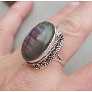 Silver ring with oval cabochon Labradorite and carved head 19