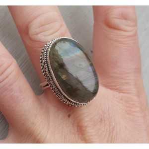 Silver ring with oval cabochon Labradorite and carved head 19