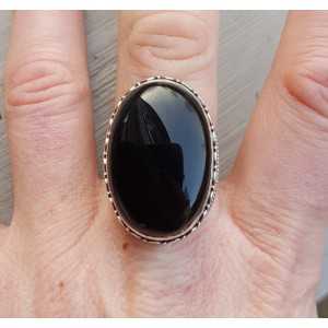 Silver ring with cabochon Onyx and carved head 18.5