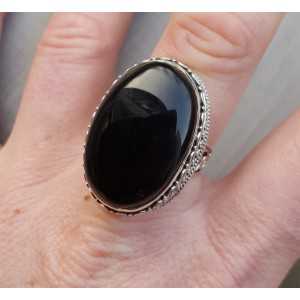 Silver ring with cabochon Onyx and carved head 18.5
