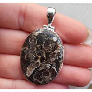 Silver pendant with wide oval-shaped Turitella Agate
