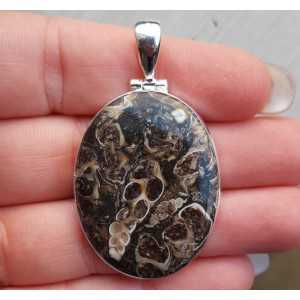 Silver pendant with wide oval-shaped Turitella Agate