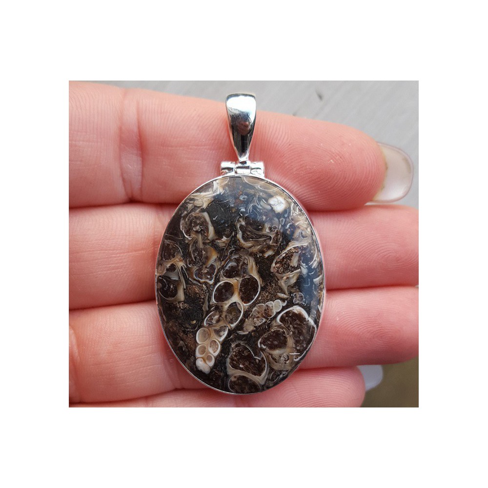 Silver pendant with wide oval-shaped Turitella Agate