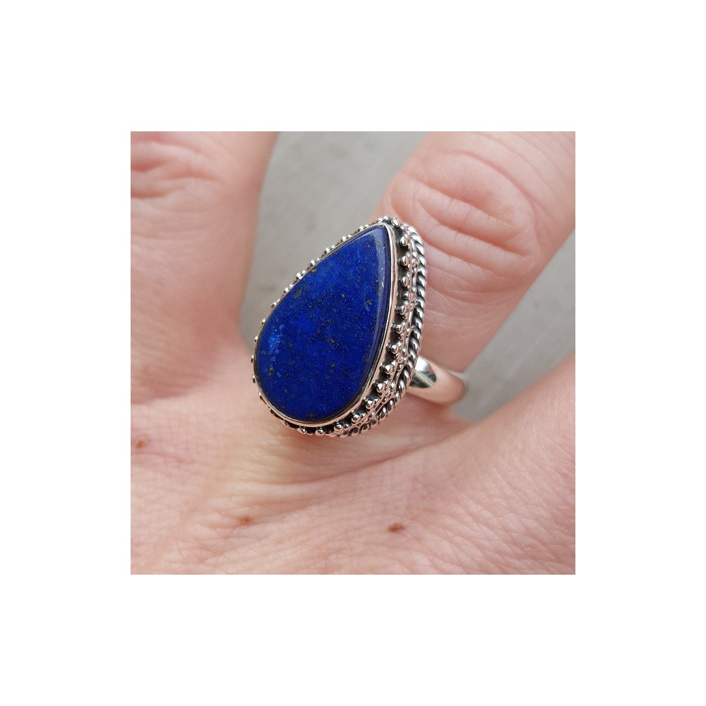 Silver ring set with Lapis Lazuli and carved head 17 mm