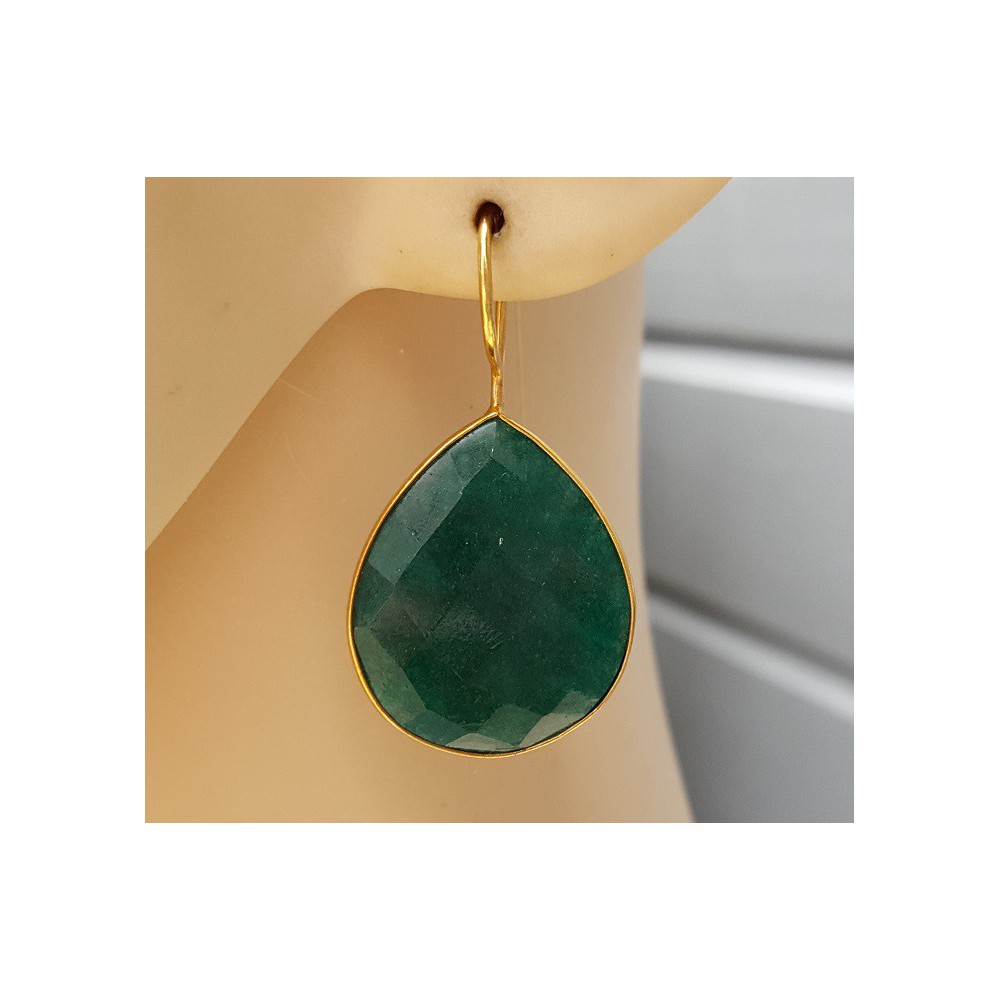 Gold plated earrings set with teardrop Emerald