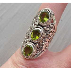 Silver ring set with Peridot and open worked band 16.5
