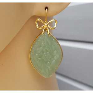 Gold plated earrings with carved light green Chalcedony