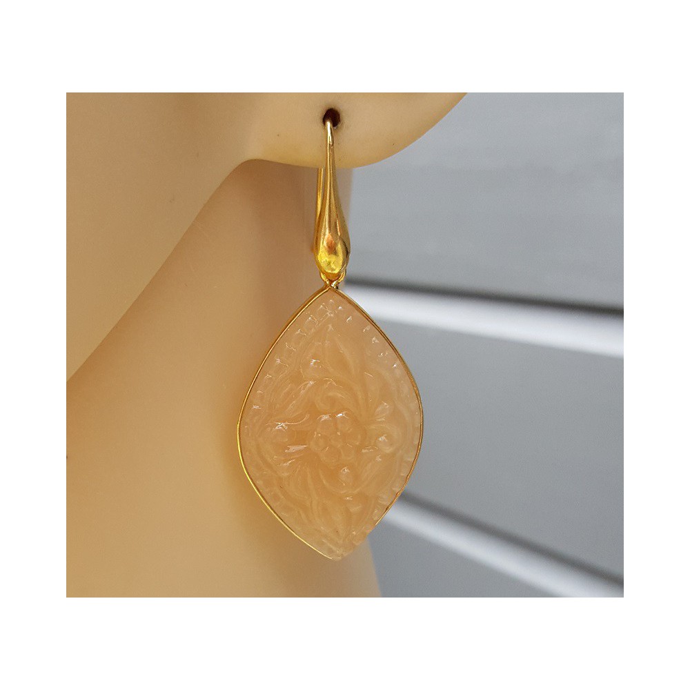 Gold plated earrings with cut-out orange variety of Chalcedony