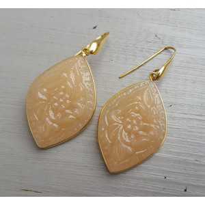 Gold plated earrings with cut-out orange variety of Chalcedony