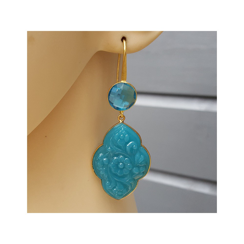 Gold plated earrings with blue Topaz and carved Chalcedony quartz