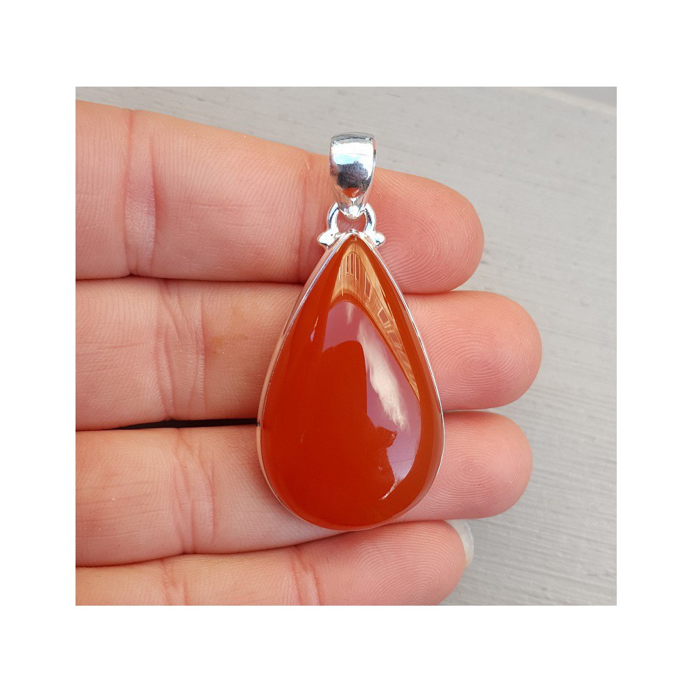 Silver pendant set with oval cabochon Carnelian