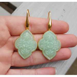 Gold plated earrings with carved light green Chalcedony
