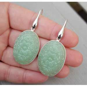 Zilveren oorbellen met ovale uitgesneden licht groene Chalcedoon quartz