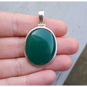Silver pendant with wide oval cabochon green Onyx