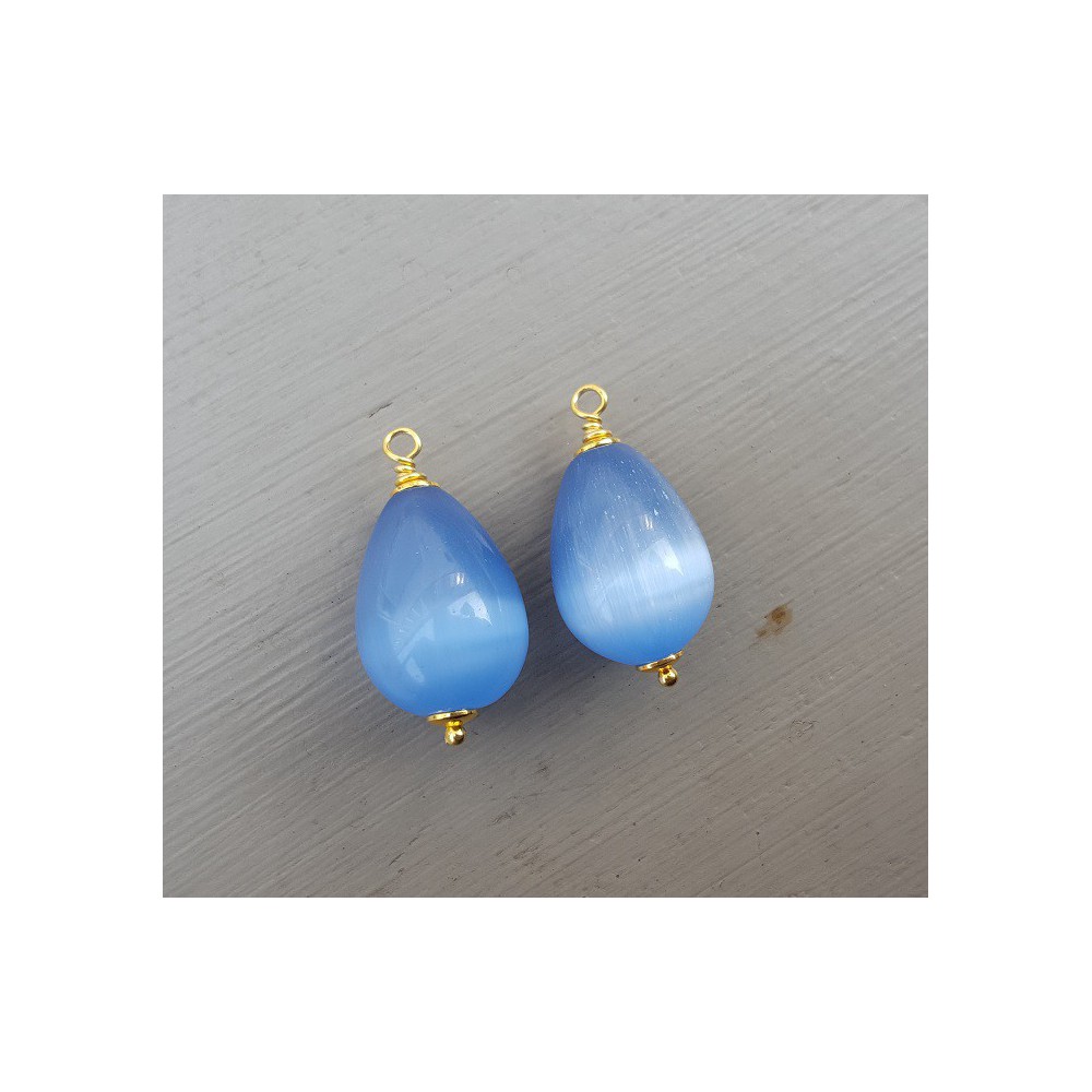 Goud vergulde losse hanger set met blauwe Kattenoog