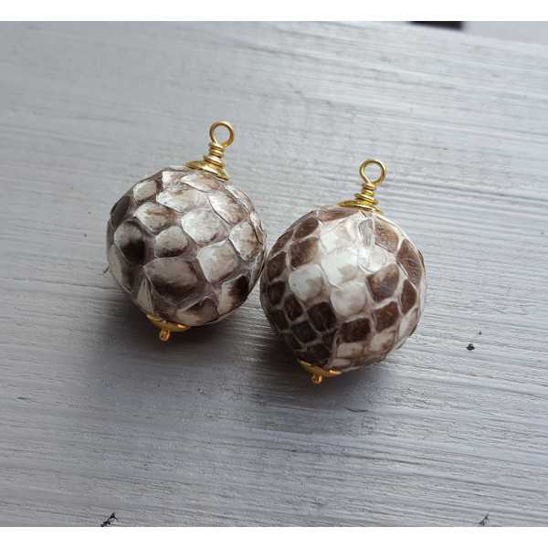 Gold plated pendant set with sphere of Snakeskin 