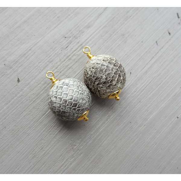 Gold plated loose pendant set with a sphere of Snakeskin