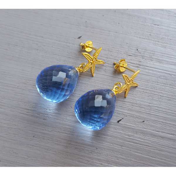 Oorbellen met zeester en blauw Topaas quartz briolet