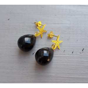 Earrings with starfish and black Onyx briolet 