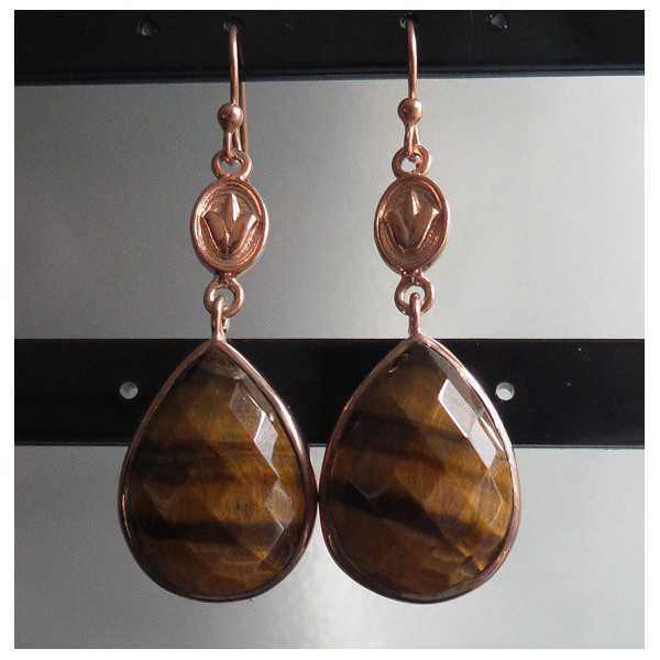Gold plated earrings made with oval shape faceted tiger's eye 