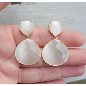 Gold plated earrings with white cats eye