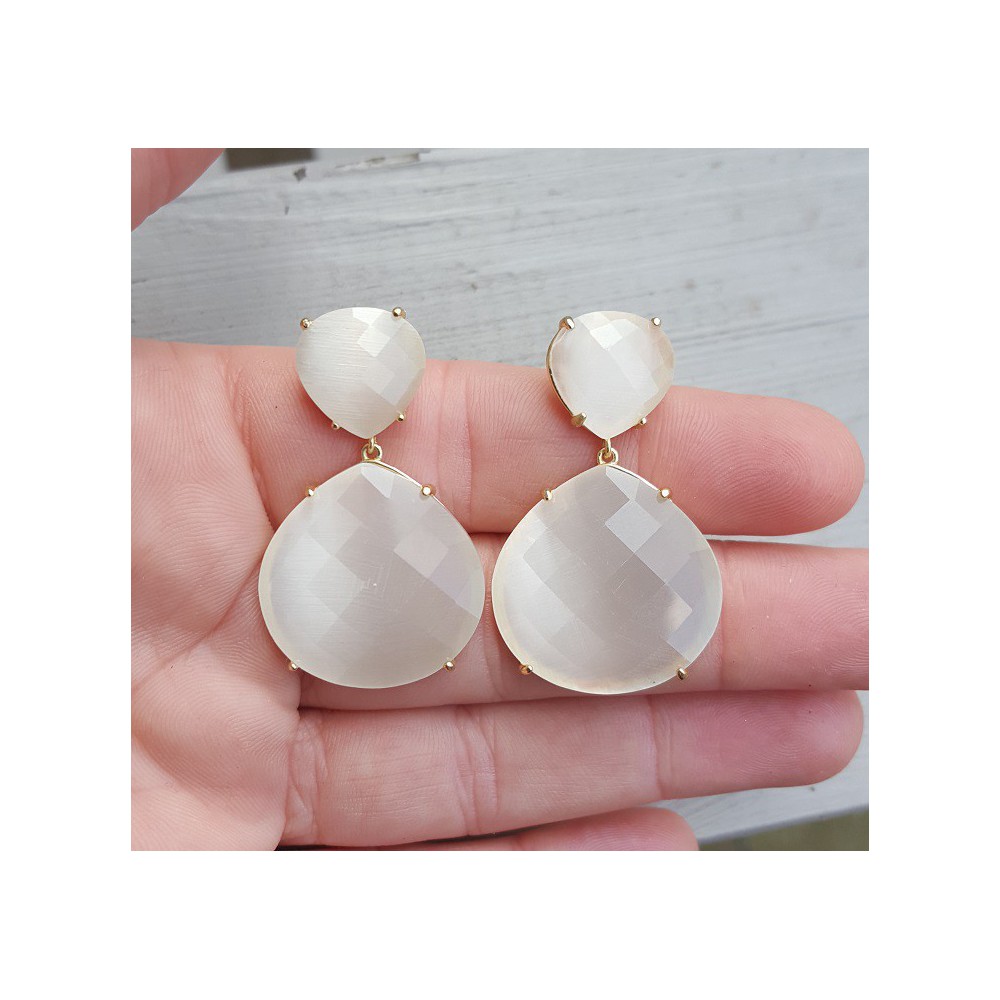 Gold plated earrings with white cats eye