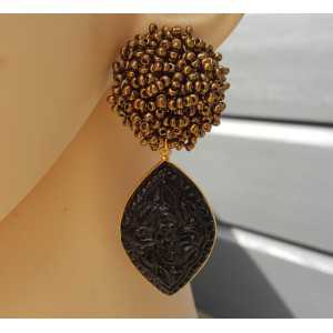 Gold plated earrings oorknoppen of beads and carved black Onyx