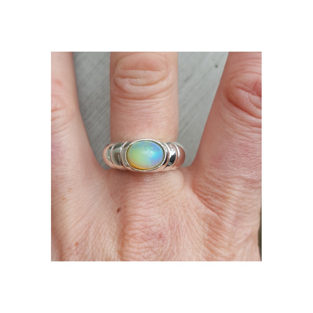 Silver ring traverse oval Ethiopian Opal 18