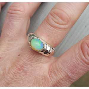 Silver ring traverse oval Ethiopian Opal 18
