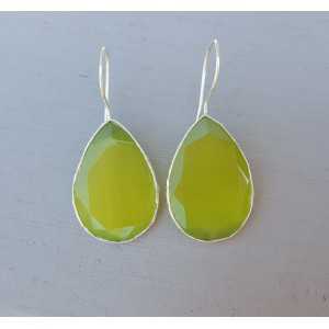 Silver earrings with large oval green cats eye