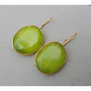 Gold plated earrings set with green cats eye
