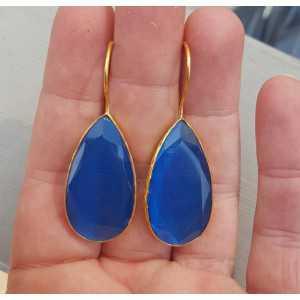 Gold plated earrings set with narrow teardrop blue cat's eye