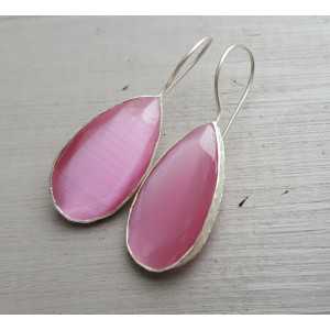 Silver earrings set with narrow teardrop shaped pink cat's eye