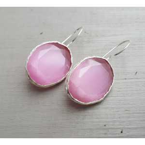 Silver earrings set with pink cats eye