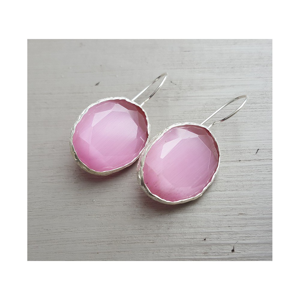 Silver earrings set with pink cats eye